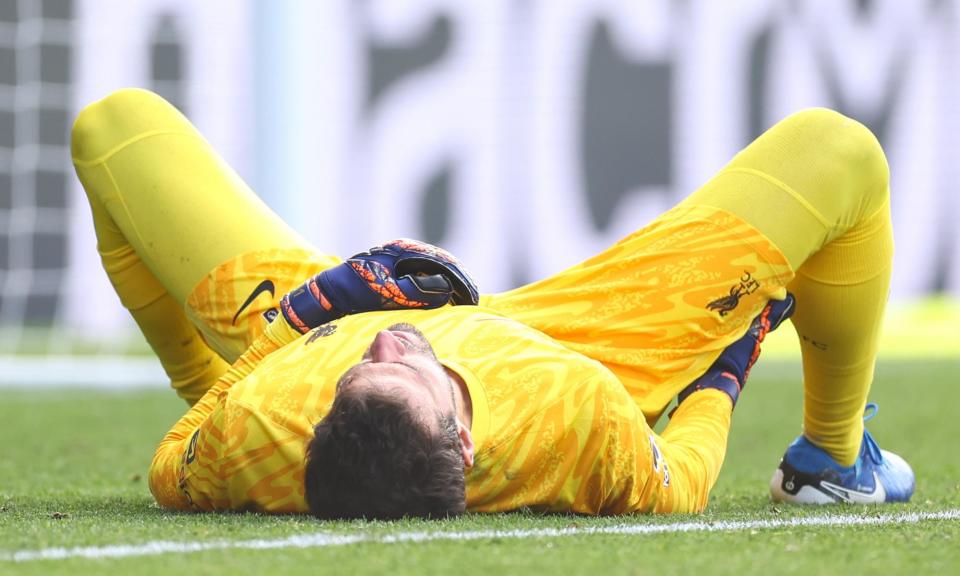 <span>Liverpool goalkeeper Alisson goes down injured against Crystal Palace.</span><span>Photograph: Jacques Feeney/Offside/Getty Images</span>