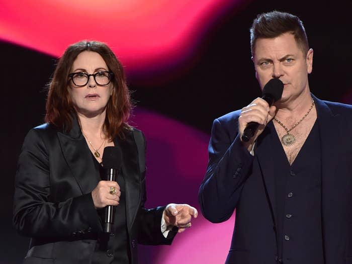 Megan Mullally and Nick Offerman talking on stage