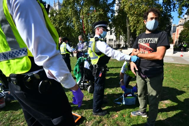 Police detain two Extinction Rebellion protesters in Parliament Square 