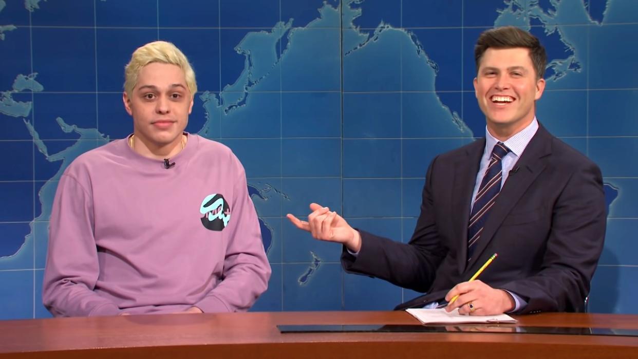  Screenshot of Pete Davidson and Colin Jost on Weekend Update. 