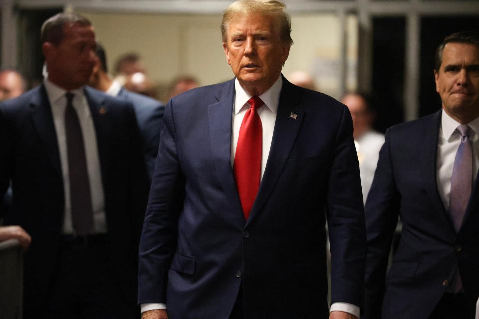 Former President Donald Trump arrives to State Supreme court in Manhattan on Thursday, Feb. 15, 2024. The election interference trial had initially been set to begin on March 4, but the date was scrapped when Trump began pursuing immunity claims. (Jefferson Siegel/The New York Times)