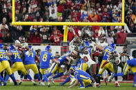 Los Angeles Rams' Matt Gay (8) kicks a 30-yard field goal to defeat the Tampa Bay Buccaneers during the second half of an NFL divisional round playoff football game Sunday, Jan. 23, 2022, in Tampa, Fla. (AP Photo/John Raoux)