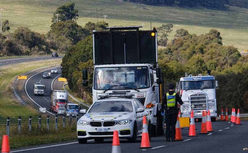 A checkpoint set up on the Calder Highway near Gisborne. Source: AAP