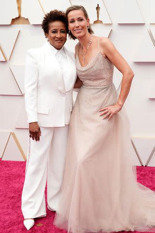 <p>Kevin Mazur/WireImage</p> Wanda Sykes and Alex Sykes attend the 94th Annual Academy Awards on March 27, 2022 in Hollywood, California.