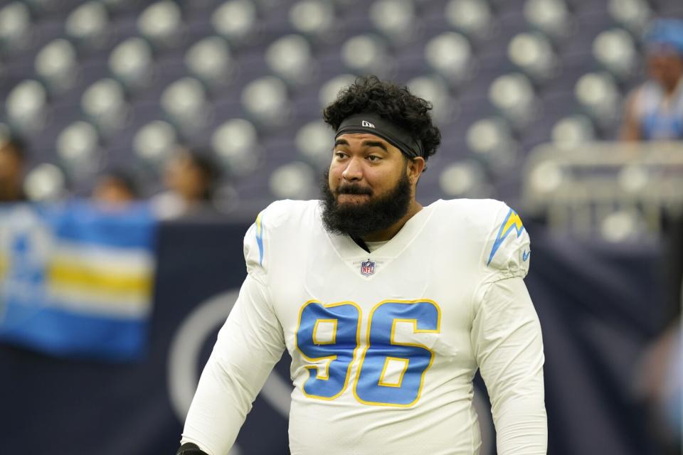 Chargers defensive lineman Breiden Fehoko (96) during pregame warmups before a preseason game against the Houston Texans.