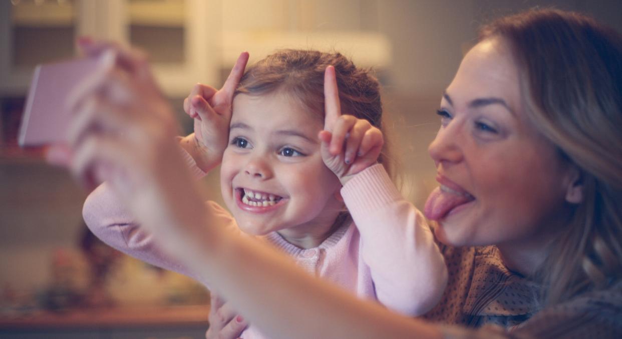 A furious mum has been banned from posting pictures of her kids in their family Whatsapp group [Image: Getty]