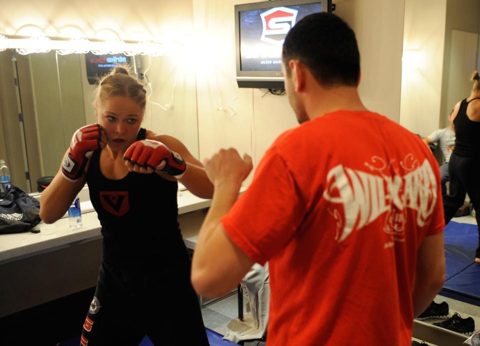 LAS VEGAS - NOVEMBER 18: Ronda Rousey warms up before her fight with Julia Budd backstage at the Pearl at the Palms on November 18, 2011 in Las Vegas, Nevada. (Photo by Todd Lussier/Forza LLC/Forza LLC via Getty Images)