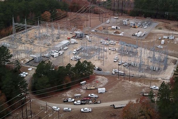 PHOTO: Duke Energy workers repair a crippled electrical substation that they said was hit by gunfire after the Moore County Sheriff said that vandalism caused a mass power outage, in Mineral Springs near Pinehurst, N.C., Dec. 6, 2022.   (Drone Base/Reuters)