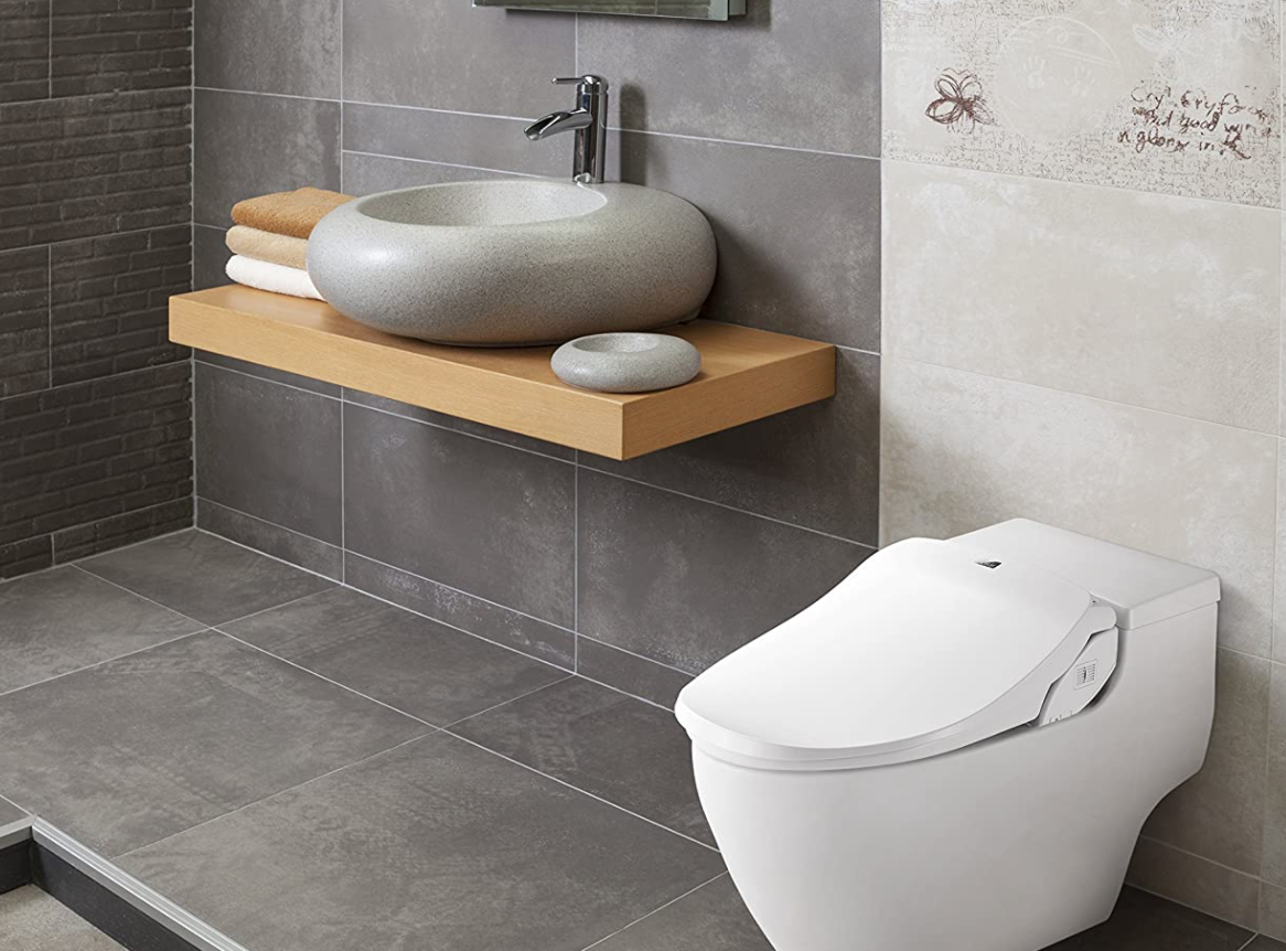 A sleek bathroom with toilet and sink