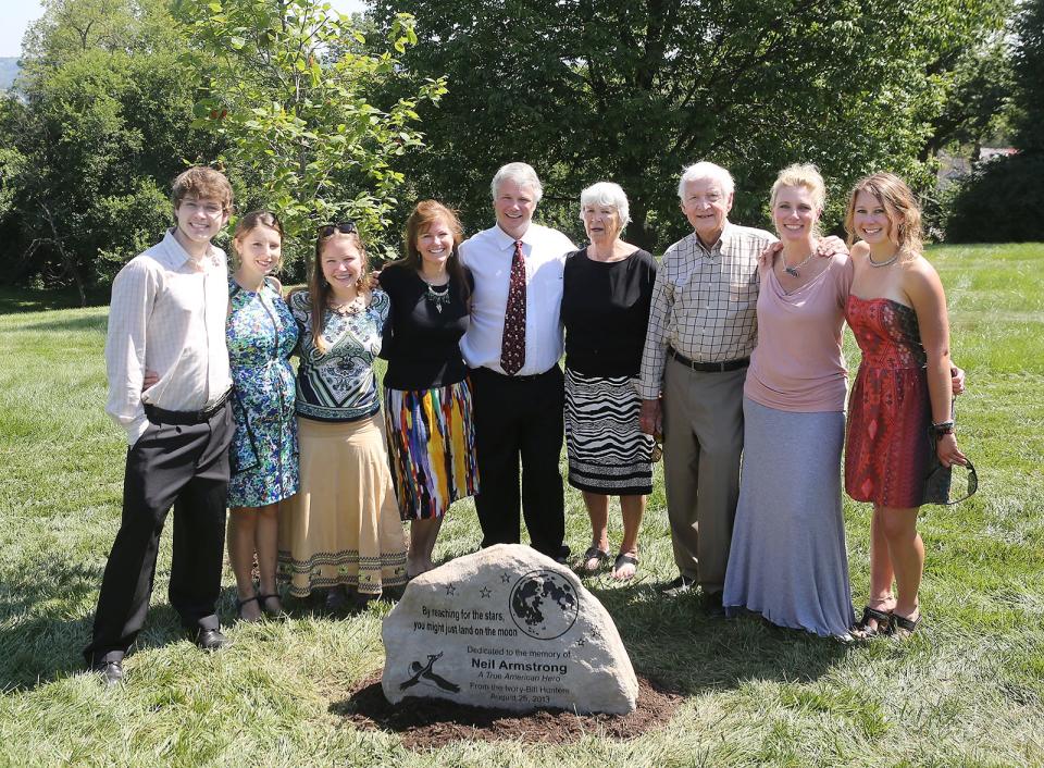 Neil Armstrong's family stands in 2013 in front of a memorial stone and tree dedicated to the former astronaut at the Cincinnati Observatory Center in Hyde Park on Sunday, which was the first anniversary of Armstrong's death. From left are Andrew Armstrong, Oksana Armstrong, Kali Armstrong, Wendy Armstrong, son Mark Armstrong, Janet Armstrong, John Ruthven (a close family friend and artist), Debbie Lentz and Tori Lentz. Janet Armstrong, who died in 2018, was Neil's first wife.