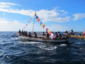 Out to sea in Lamalera Village: The whalers of Lamalera in their boat on the Sawu Sea. (