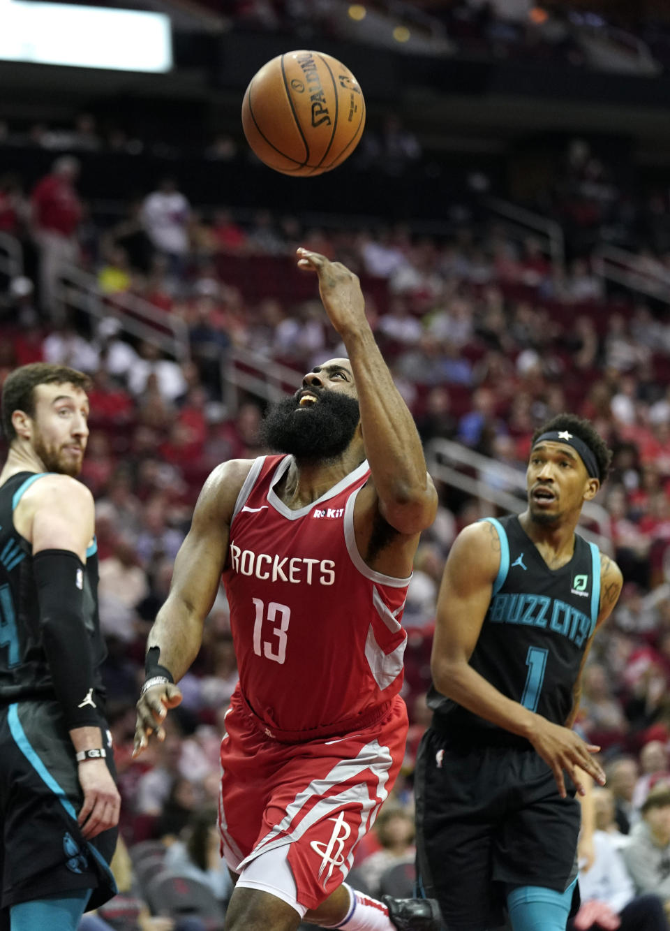 Houston Rockets' James Harden (13) shoots after being fouled by Charlotte Hornets' Malik Monk (1) during the second half of an NBA basketball game Monday, March 11, 2019, in Houston. The Rockets won 118-106. (AP Photo/David J. Phillip)