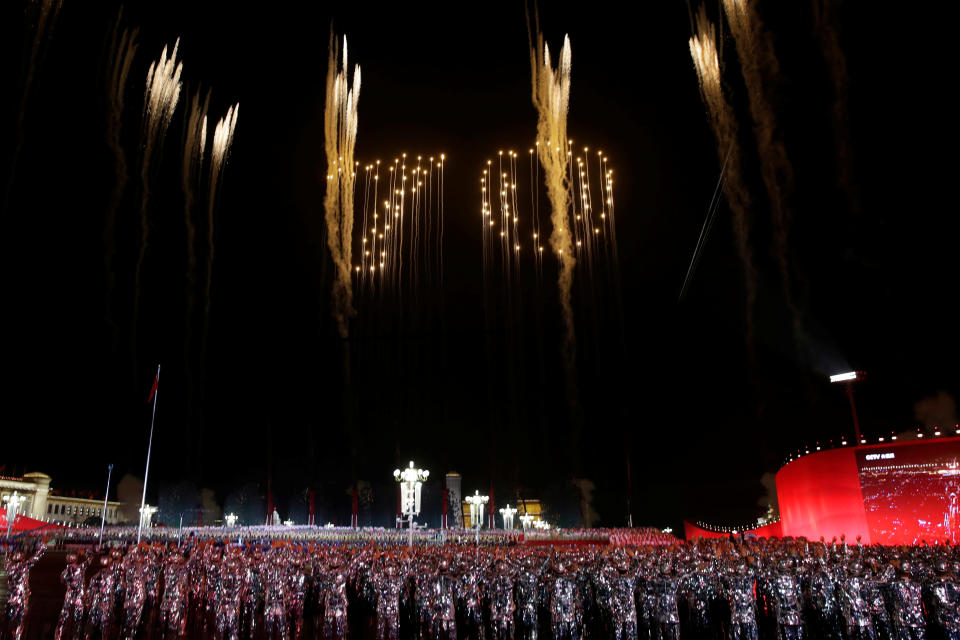 The number "70" formed by fireworks is seen in the sky over Tiananmen Square during the evening gala marking the 70th founding anniversary of People's Republic of China, on its National Day in Beijing, China October 1, 2019. (Photo: Jason Lee/Reuters)