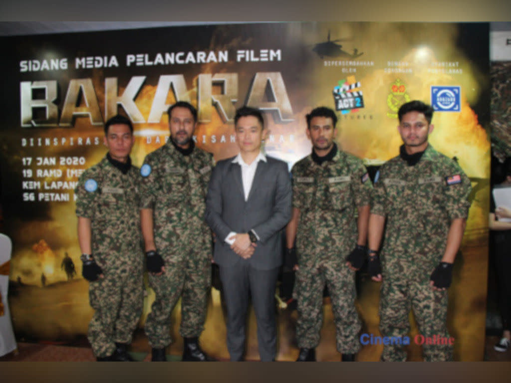 Adrian Teh with the main cast of "Bakara" at the movie's launch last year.