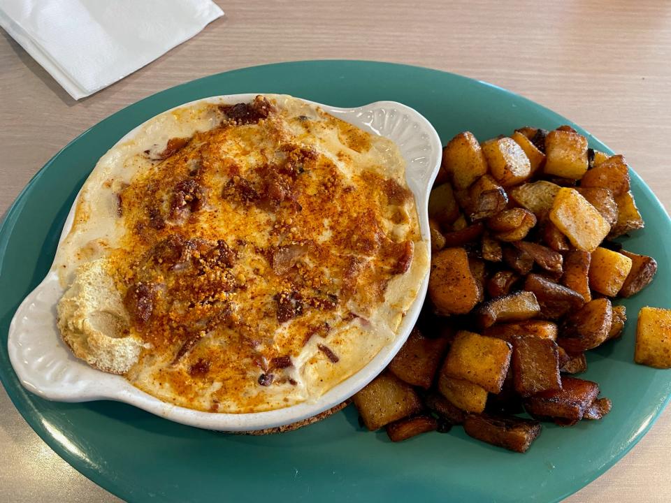 The parmesan baked egg at The Sandbox Cafe Cafe in Surf City.