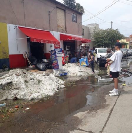 Ice is seen on a street after a heavy storm of rain and hail in Guadalajara