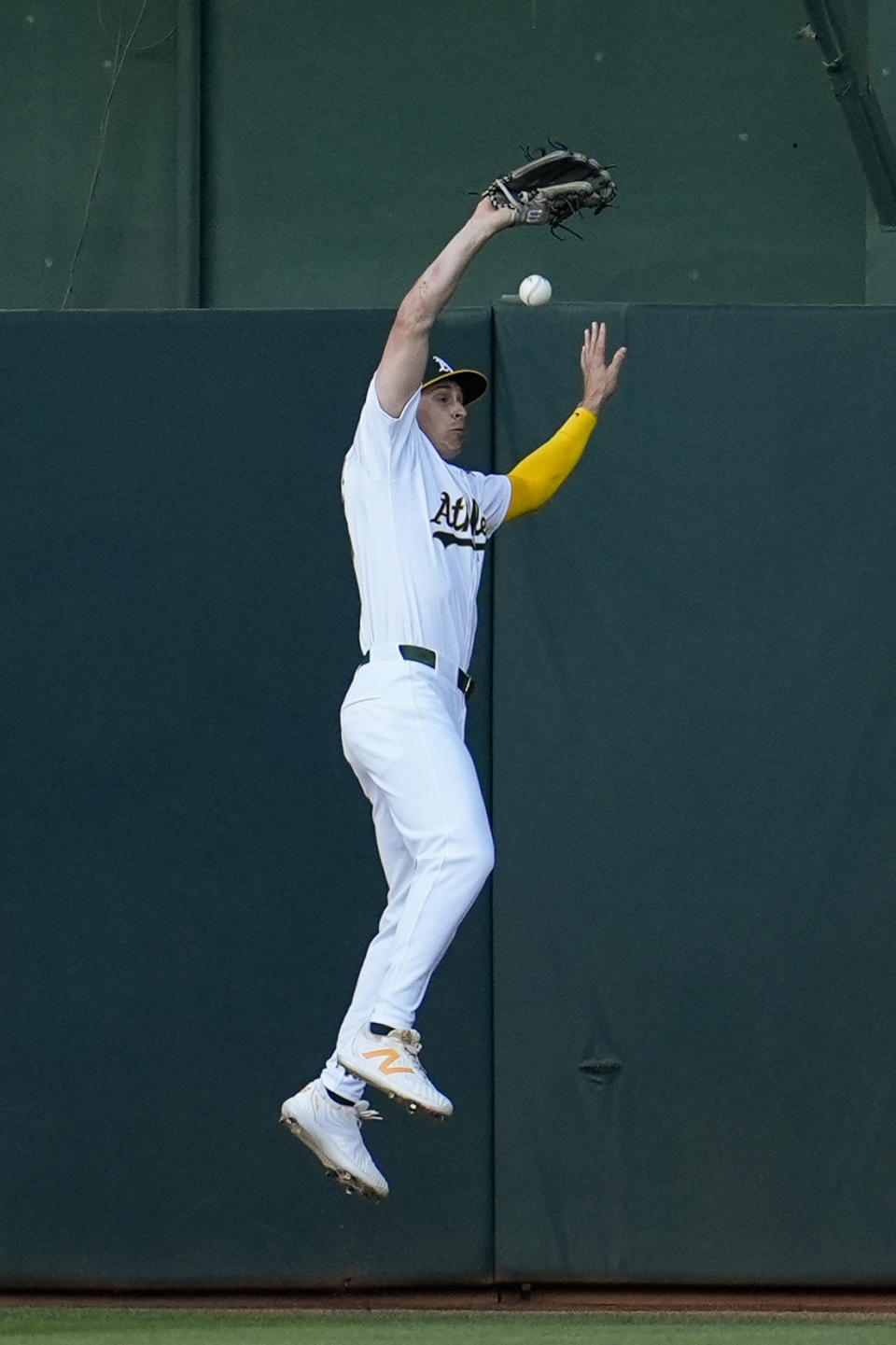 Oakland Athletics center fielder JJ Bleday is unable to catch a fly ball hit by Boston Red Sox's Enmanuel Valdez during the second inning of a baseball game Monday, April 1, 2024, in Oakland, Calif. Valdez reached second on the fielding error. (AP Photo/Godofredo A. Vásquez)