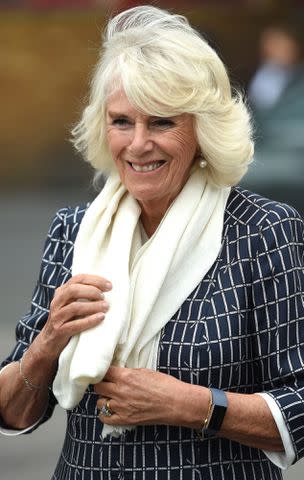 EDDIE MULHOLLAND/POOL/AFP via Getty Images Queen Camilla visits the Swindon Fire Station near London on July 6, 2020.