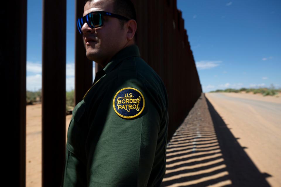 U.S. Border Patrol spokesman Fidel Baca tracks a recent group of migrants who had crossed the border wall in New Mexico in late August 2023.