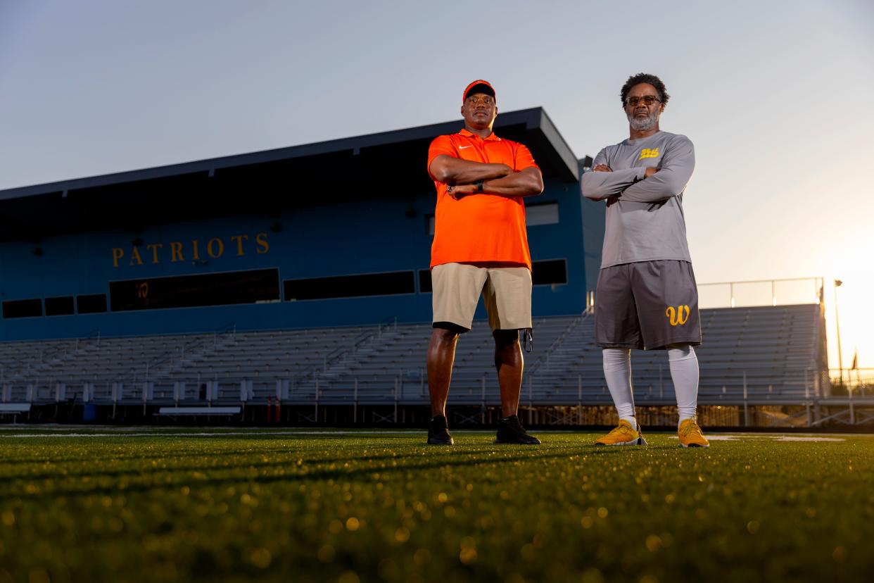 Putnam City coach Willis Alexander, left, and Putnam City West coach Gregory Johnson pose for a photo at Putnam City West in Oklahoma City, Wednesday, Sept. 6, 2023.