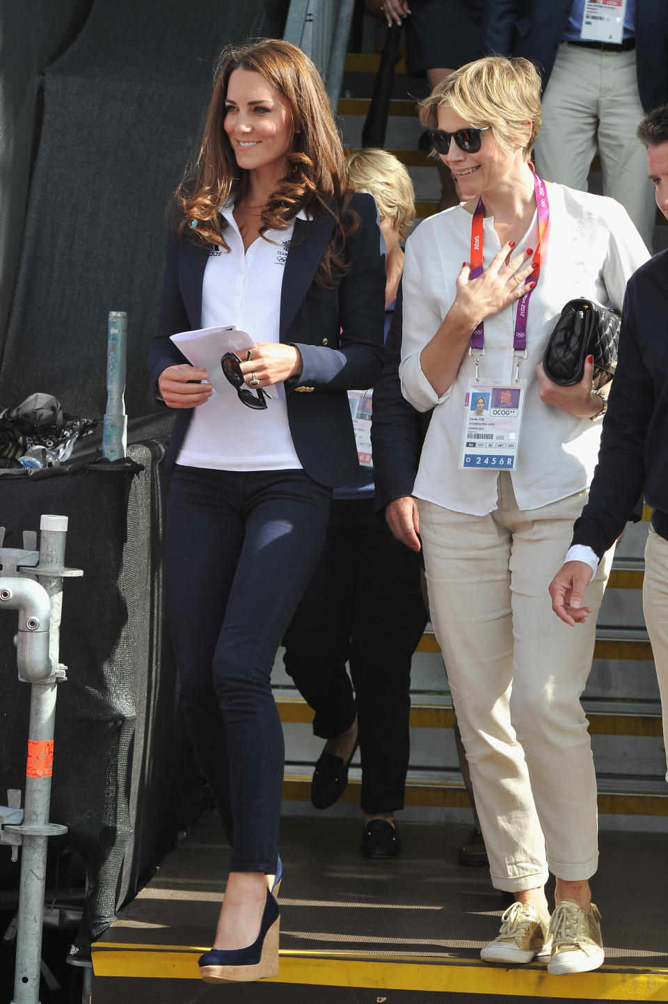 While the outfit that Kate wore to the Cross Country Equestrian event on July 30 is very simple, what makes it work is the impeccable fit of Kate’s pants and blazer. Learn where you can buy Kate’s perfectly tailored jeans <a href=" http://shine.yahoo.com/fashion/found-kate-middleton-8217-169-j-brand-jeans-204000371.html;_ylt=A2KJjb1z.yBQRRkAphkhmolQ" data-ylk="slk:here.;elm:context_link;itc:0;sec:content-canvas;outcm:mb_qualified_link;_E:mb_qualified_link;ct:story;" class="link  yahoo-link">here.</a>