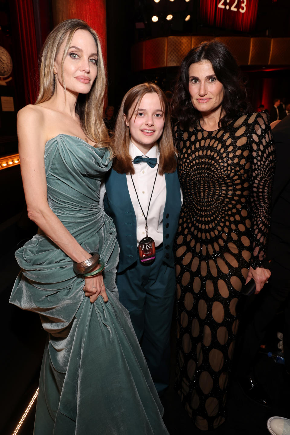 NEW YORK, NEW YORK - JUNE 16: (L-R) Angelina Jolie, Vivienne Jolie-Pitt and Idina Menzel attend The 77th Annual Tony Awards at David H. Koch Theater at Lincoln Center on June 16, 2024 in New York City. (Photo by Kevin Mazur/Getty Images for Tony Awards Productions)