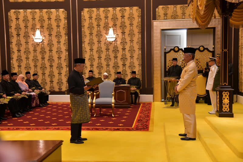 Muhyiddin Yassin takes oath during the swearing-in ceremony as the 8th prime minister of Malaysia in Kuala Lumpur