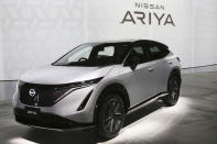 Nissan Motor Co.'s new electric crossover Ariya is displayed at Nissan Pavilion in Yokohama near Tokyo Tuesday, July 14, 2020. The Ariya is the Japanese automaker’s first major all-new model since getting embroiled in the scandal surrounding former Chairman Carlos Ghosn. (AP Photo/Koji Sasahara)