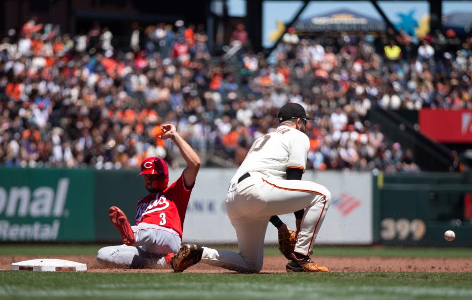 Jun 26, 2022; San Francisco, California, USA; Cincinnati Reds right fielder Albert Almora Jr. (3) slides safely into third base ahead of the relay to San Francisco Giants third baseman Evan Longoria (10) during the third inning at Oracle Park. Mandatory Credit: D. Ross Cameron-USA TODAY Sports