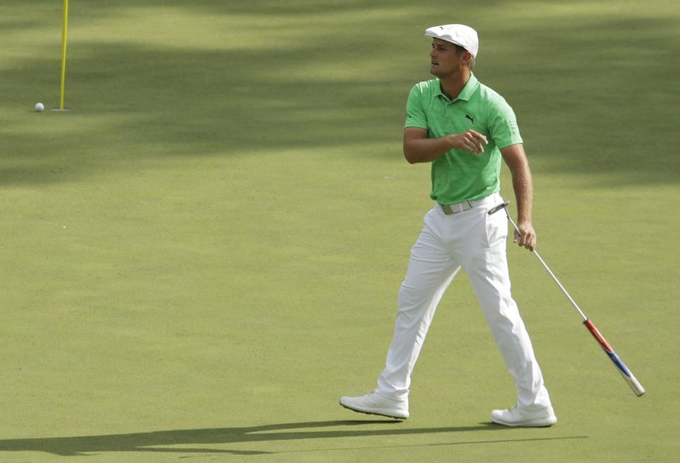Bryson DeChambeau reacts to a missed putt on the 11th hole during the first round for the Masters golf tournament Thursday, April 11, 2019, in Augusta, Ga. (AP Photo/Charlie Riedel)