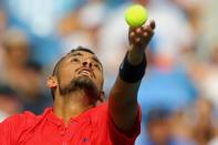 Aug 20, 2017; Mason, OH, USA; Nick Kyrgios (AUS) serves against Grigor Dimitrov (BUL) in the finals during the Western and Southern Open at the Lindner Family Tennis Center. Mandatory Credit: Aaron Doster-USA TODAY Sports