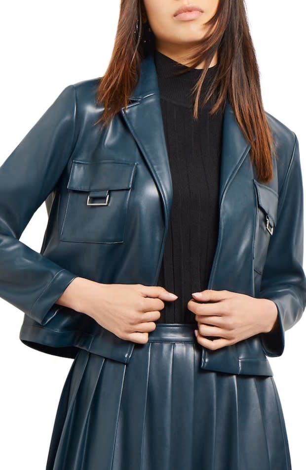 <p>Nordstrom</p><p>Reds, browns, and oranges are your typical fall colors, but they’re not the only options. Take the marine teal of the Misook Faux Leather Crop Blazer, for example. The shade is seasonal and unexpected at the same time. Plus, the jacket itself is expertly constructed and extra chic, so you can expect compliments everywhere you go.</p>