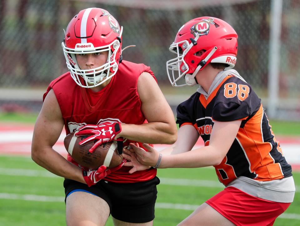 Players work on their football skills during practice at Manitowoc Lincoln High School, Tuesday, August 1, 2023, in Manitowoc, Wis. (Syndication: Herald Times Reporter)