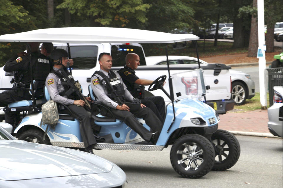 Law enforcement respond to the University of North Carolina at Chapel Hill campus in Chapel Hill, N.C., on Monday, Aug. 28, 2023, after the university locked down and warned of an armed person on campus. (AP Photo/Hannah Schoenbaum)