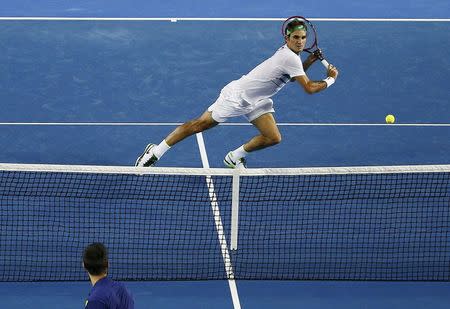 Switzerland's Roger Federer hits a shot during his semi-final match against Serbia's Novak Djokovic at the Australian Open tennis tournament at Melbourne Park, Australia, January 28, 2016. REUTERS/Jason O'Brien Action Images via Reuters