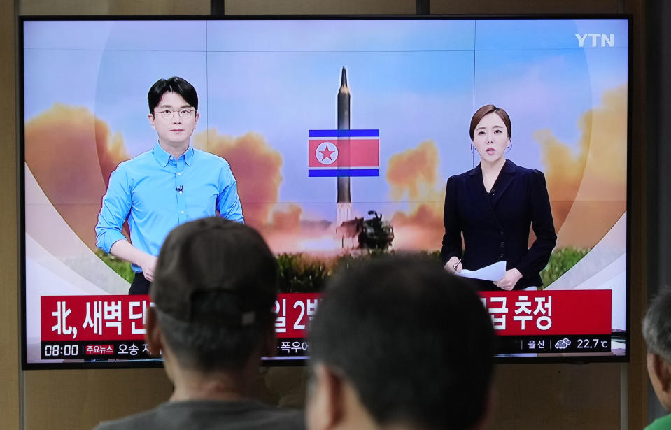 People watch a television reporting North Korea's missile launch during a news program at the Seoul Railway Station in Seoul, South Korea, Wednesday, July 19, 2023. North Korea fired two short-range ballistic missiles into its eastern sea early Wednesday in what appeared to be a statement of defiance as the United States deploys a nuclear-armed submarine to South Korea for the first time in decades. (AP Photo/Ahn Young-joon)