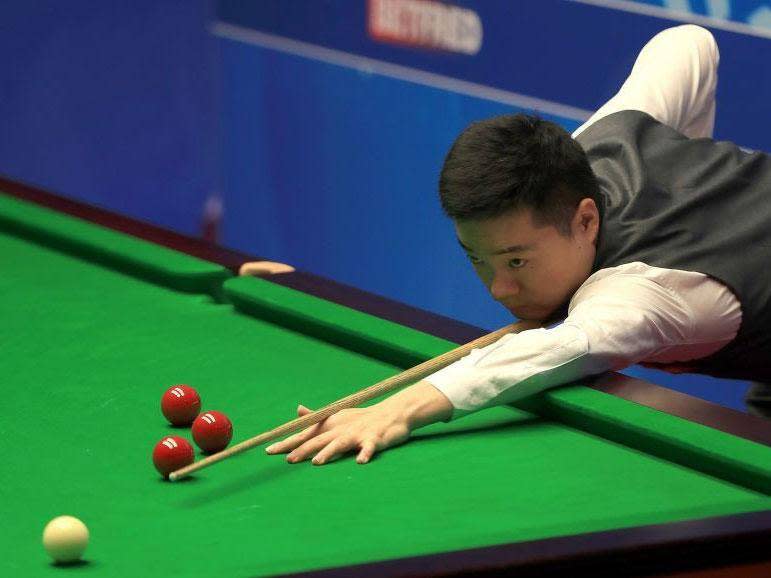 Ding is safely through to the second round (PA)