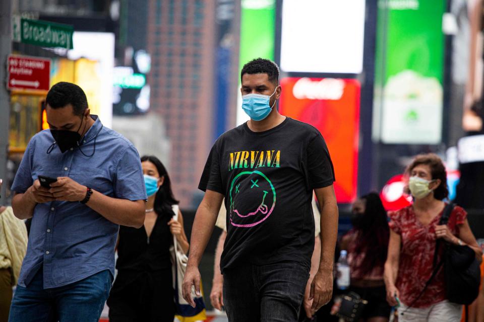 A man wears a face masks in Midtown Manhattan in New York on July 29 2021.