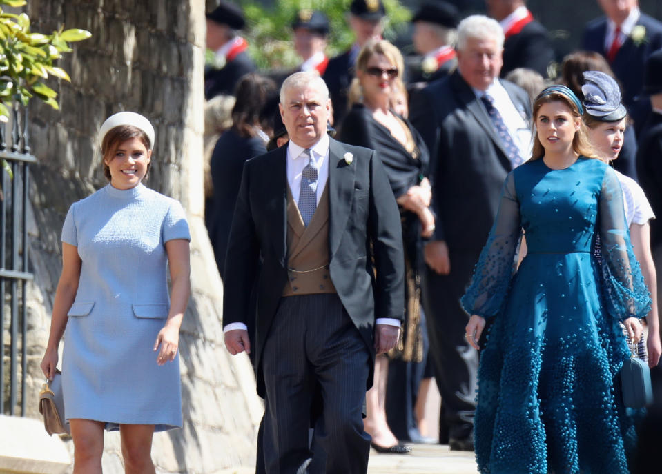 Princess Eugenie, the Duke of York and Princess Beatrice at Meghan and Harry’s wedding in May (PA)