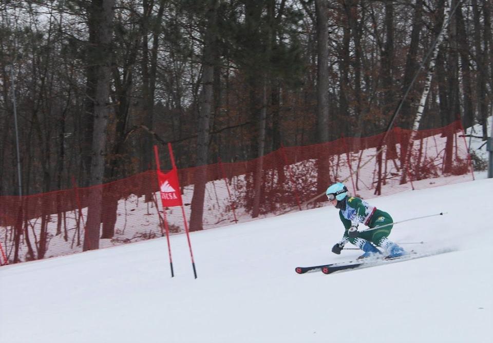 Former Gaylord skier Reagan Olli competes for the Northern Michigan University alpine ski team during the 2022 season.