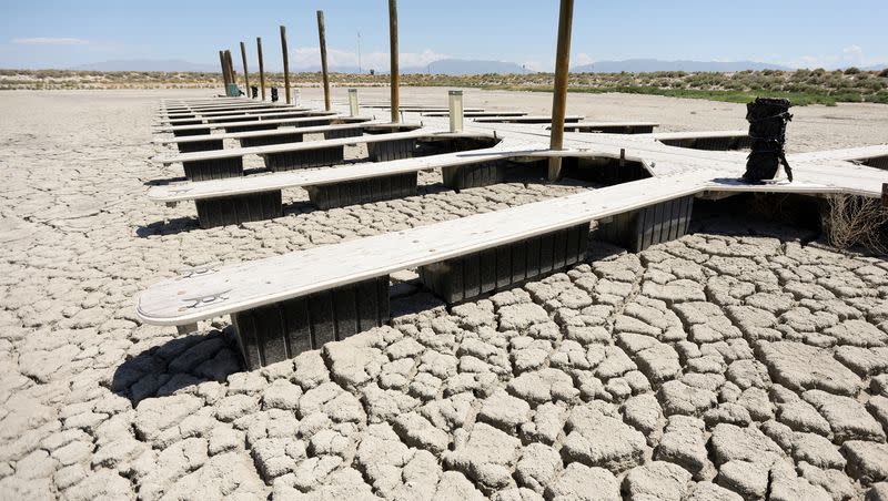 The Antelope Island marina is dried up as the Great Salt Lake experiences record low water levels on July 22, 2022. The Church of Jesus Christ of Latter-day Saints is making a permanent donation of 5,700 water shares to the lake. 