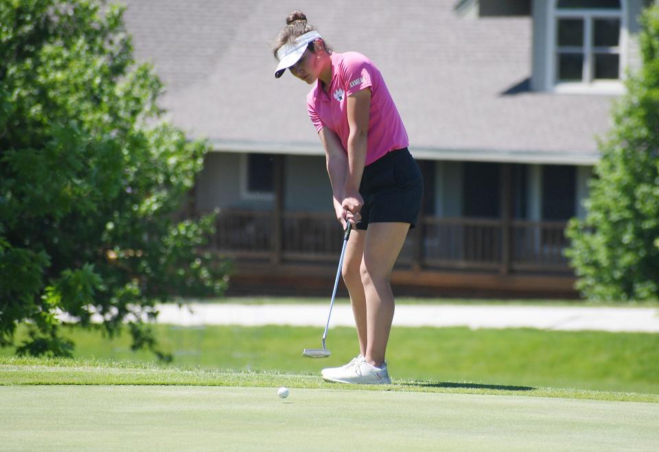 Nevada's Olivia Axmear looks at the ball after putting onto the 9th hole during the Class 3A girls state golf meet at the River Valley Golf Course Friday, May 27, 2022, in Adel, Iowa.