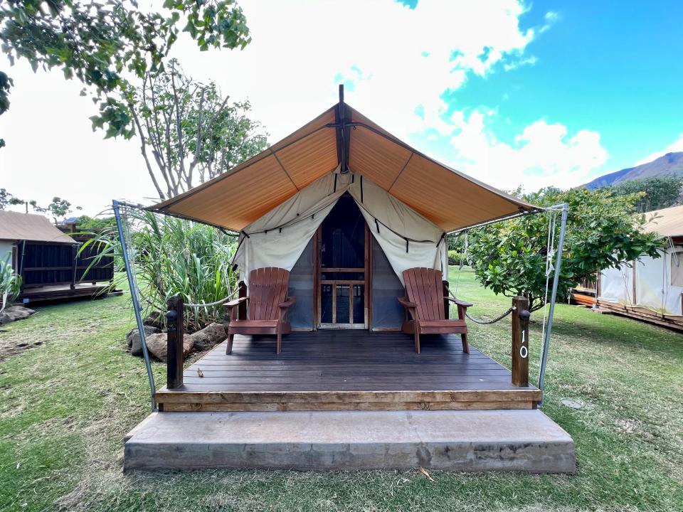 tentalow in hawaii with two chairs out front