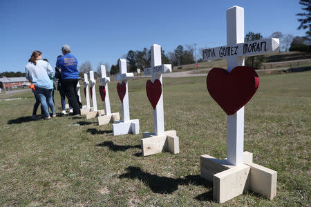 Crosses are placed in front of the Providence Baptist Church to honor the victims who died in the two deadly back-to-back tornadoes in Beauregard, Alabama, U.S., March 6, 2019. REUTERS/Shannon Stapleton