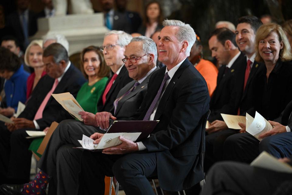 (L-R) Former US House Speaker Nancy Pelosi (D-CA), Senate Minority Leader Mitch McConnell (R-KY), US Senate Majority Leader Chuck Schumer (D-NY), and US House Speaker Kevin McCarthy (R-CA) attend a portrait unveiling for former US House Speaker Paul Ryan in Statuary Hall at the US Capitol in Washington, DC, on May 17, 2023.