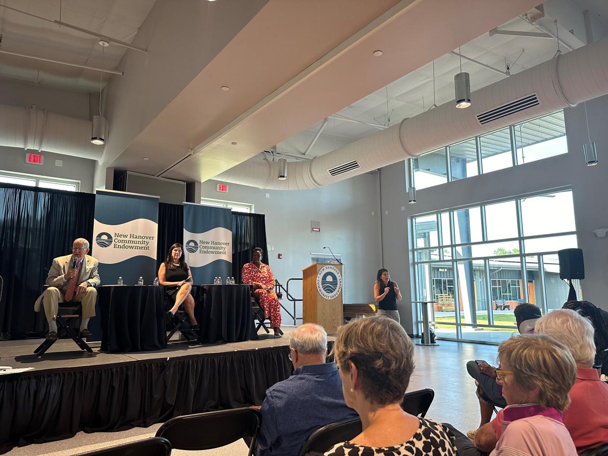 Members of the New Hanover Community Endowment, from left to right, Bill Cameron, Shannon Winslow and Lakesha McDay, answered questions from the public at the endowment's public information session on June 26 at GLOW Academy.