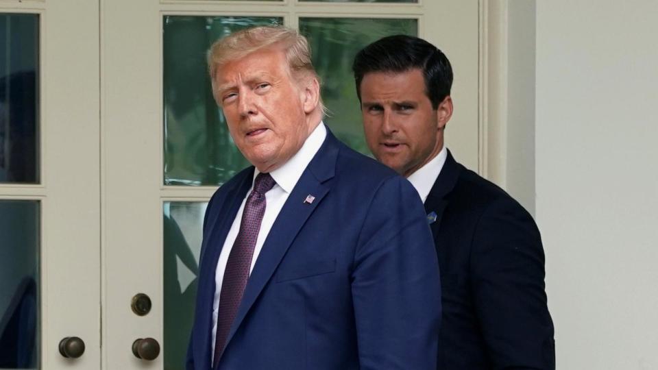 PHOTO: Former President Donald Trump and his personal aide John McEntee walk to the Oval Office of the White House in Washington, Sept. 11, 2020. (Kevin Lamarque/Reuters, FILE)