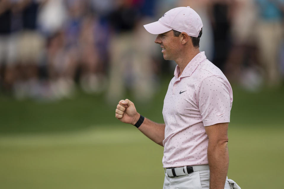 Rory McIlroy reacts after winning on the 18th hole during the fourth round of the Wells Fargo Championship golf tournament at Quail Hollow on Sunday, May 9, 2021, in Charlotte, N.C. (AP Photo/Jacob Kupferman)