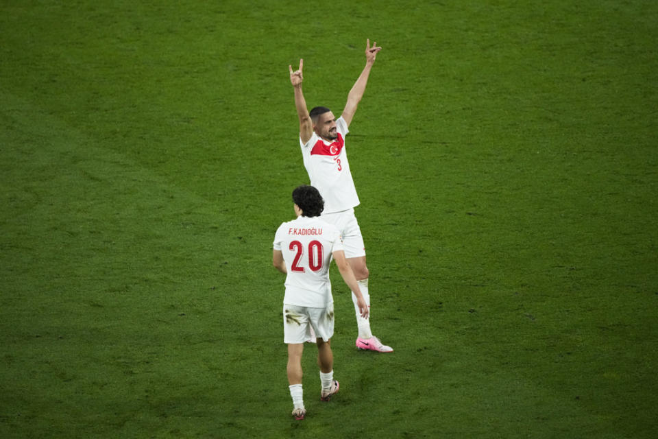 FILE - Turkey's Merih Demiral celebrates after scoring his side second goal during a round of sixteen match between Austria and Turkey at the Euro 2024 soccer tournament in Leipzig, Germany, Tuesday, July 2, 2024. UEFA has suspended Turkey player Merih Demiral for two matches for making a controversial gesture at the European Championship. (AP Photo/Ebrahim Noroozi, File)