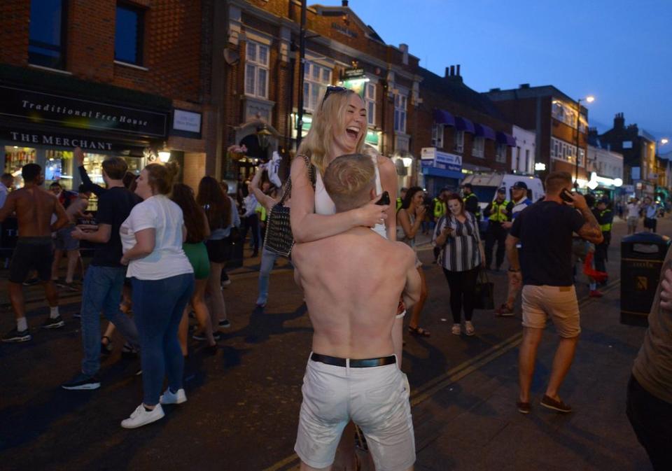 England fans in Brentwood celebrate wildly at the final whistle